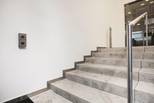 Hidden Stairwell Lift for Offices