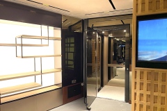 The internal cabin of the lift at KSTH features bronze mirror, copper skirting and bronze mesh panels