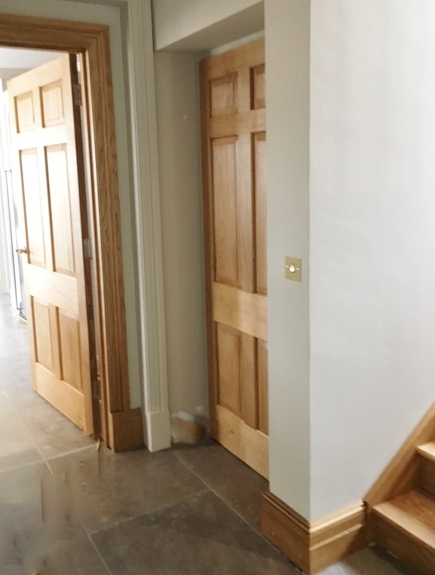 Cupboard Lift Disguised Behind Hallway Door