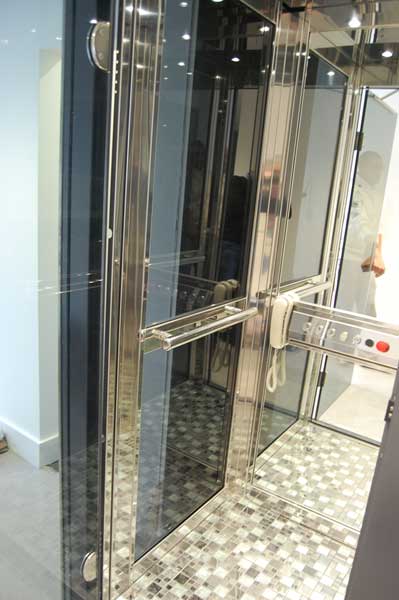 Glass Home Lift with Mosaic Ornate Floor