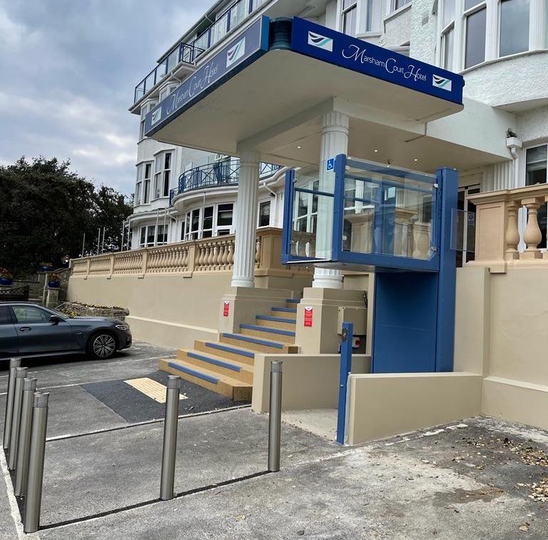 External blue powder coated platform lift at the Marsham Court Hotel in Bournemouth